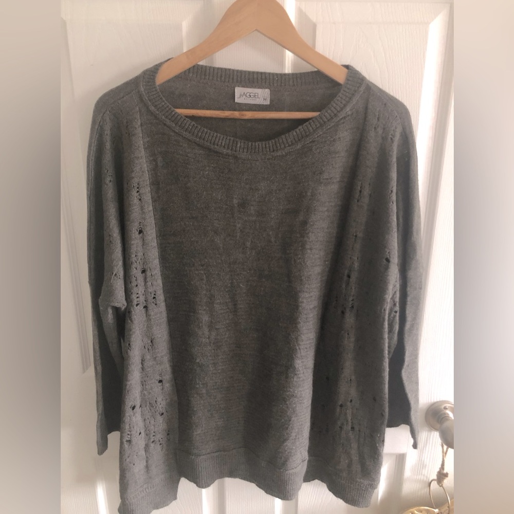 Oversized distressed look mid length sweater